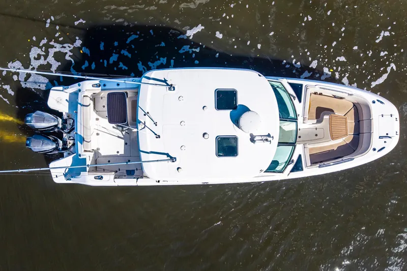 Slide: The Image of Aerial view of 2019 Boston Whaler 320 Vantage boat on water. - 12