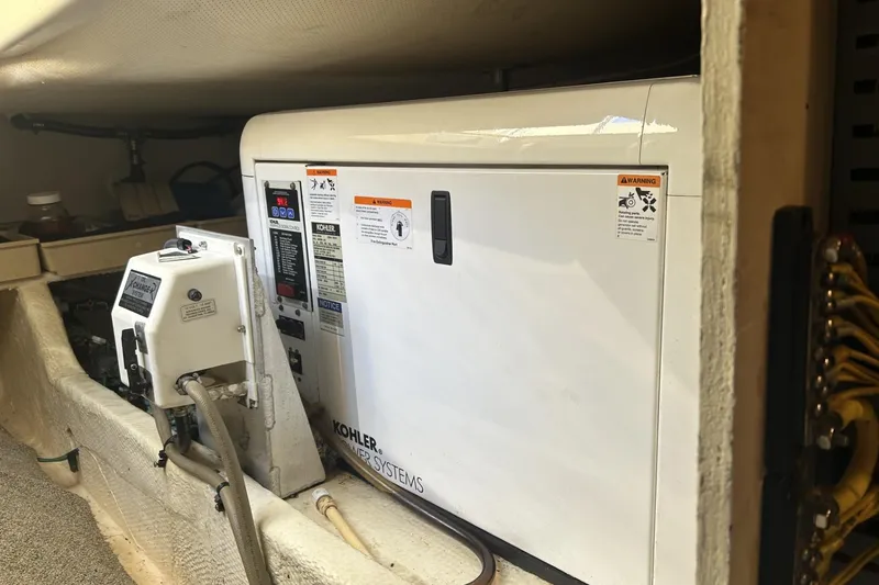 Slide: The Image of Engine room of 2008 Mainship 34 Trawler with Kohler power system. - 32
