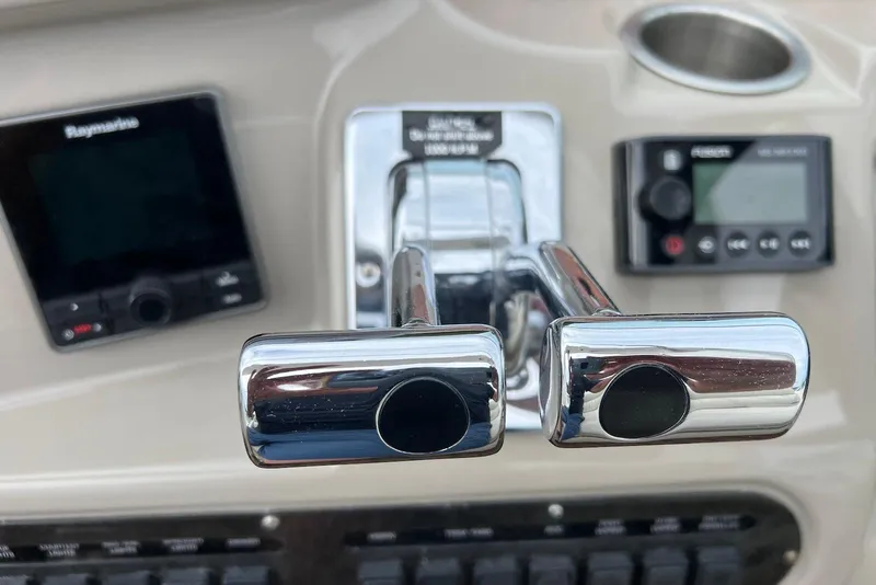 Slide: The Image of Close-up of 2003 Cruisers Yachts 3470 Express dashboard controls and navigation instruments. - 15