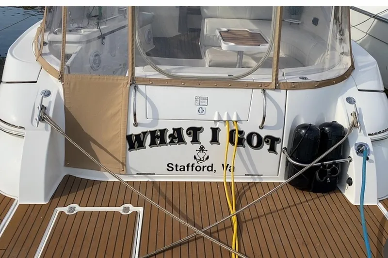 Slide: The Image of 2003 Cruisers Yachts 3470 Express boat with "What I Got" name, docked in Stafford, VA. - 16