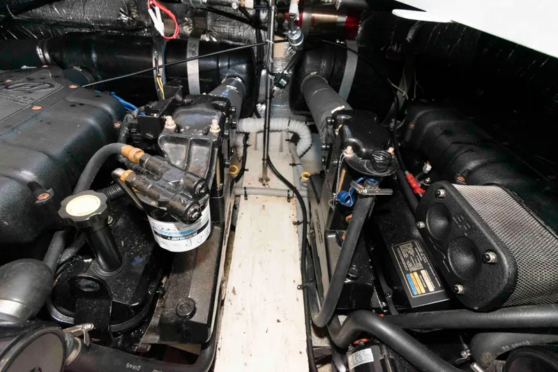 Slide: The Image of Engine room of 1999 Cruisers Yachts 3750 Motoryacht, showcasing mechanical components. - 16