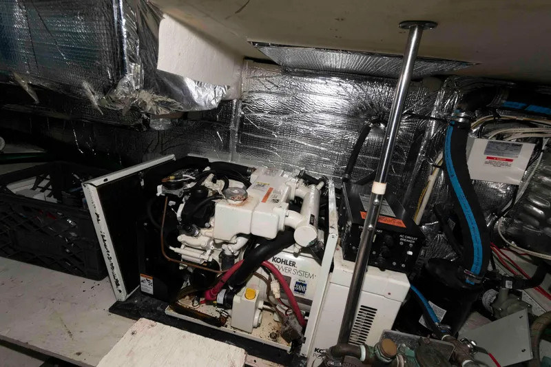 Slide: The Image of Engine room of 1999 Cruisers Yachts 3750 Motoryacht with Kohler power system. - 19