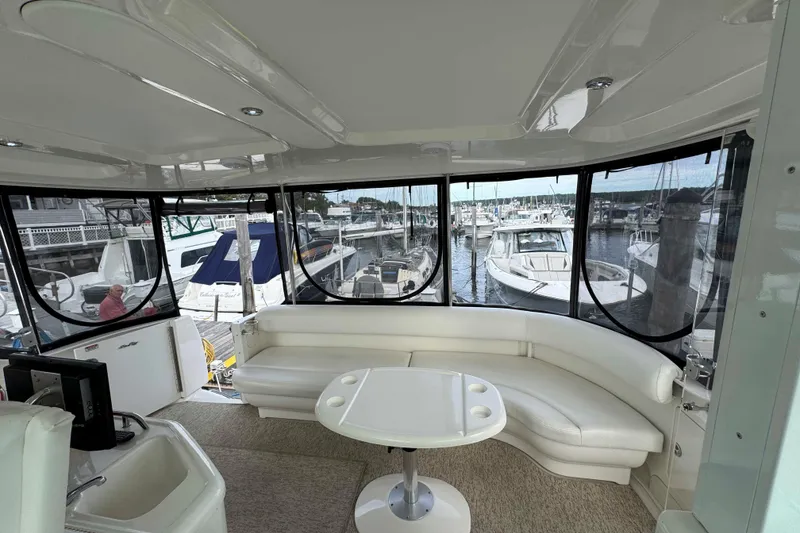 Slide: The Image of Luxurious interior of 2007 Sea Ray 40 Motor Yacht with marina view. - 10