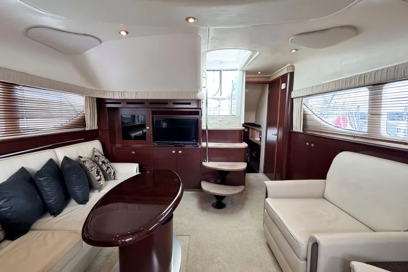 Slide: The Image of Luxurious interior of 2007 Sea Ray 40 Motor Yacht with elegant seating and modern design. - 23