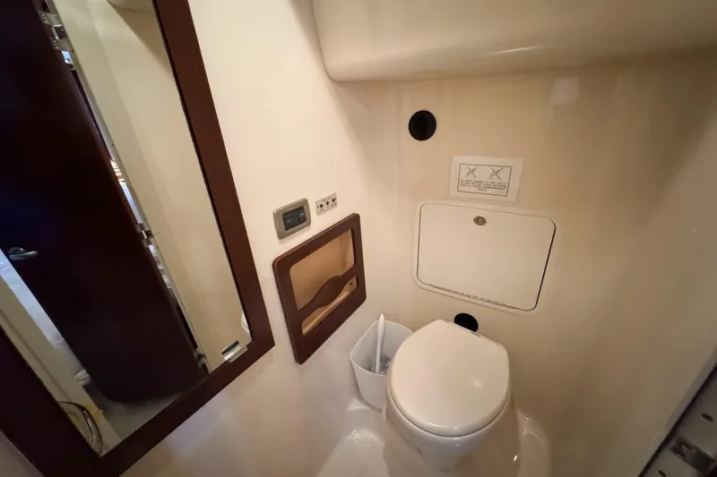 Slide: The Image of 2007 Sea Ray 40 Motor Yacht bathroom with toilet and mirror. - 30