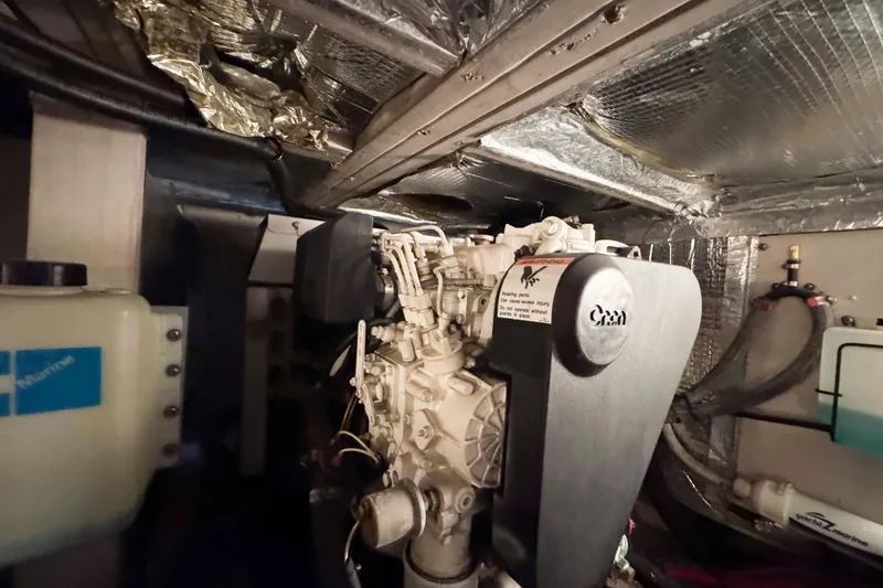 Slide: The Image of Engine room of 2007 Sea Ray 40 Motor Yacht with visible components and insulation. - 37