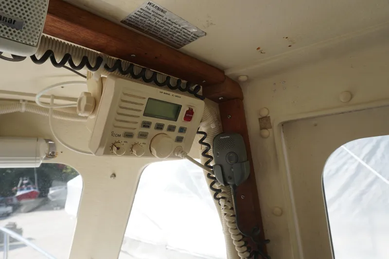 Slide: The Image of 2002 Rosborough RF-246 Sedan Cruiser interior with marine radio equipment. - 21