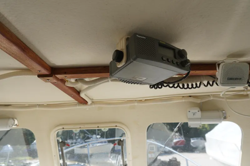 Slide: The Image of Interior of 2002 Rosborough RF-246 Sedan Cruiser with mounted radio equipment. - 22