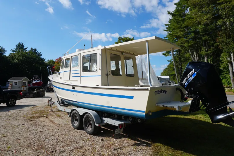 Slide: The Image of 2002 Rosborough RF-246 Sedan Cruiser on trailer, parked outdoors under a clear blue sky. - 3