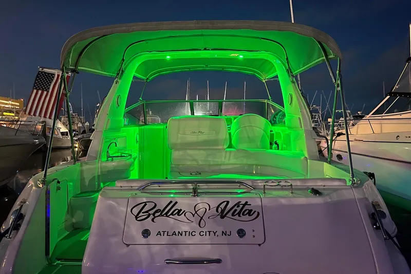 Slide: The Image of 2001 Sea Ray 310 Sundancer with green interior lighting, docked in Atlantic City, NJ. - 4