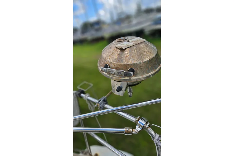 Slide: The Image of Steering wheel and Raymarine controls on 2010 Beneteau Oceanis 34 GT yacht. - 14