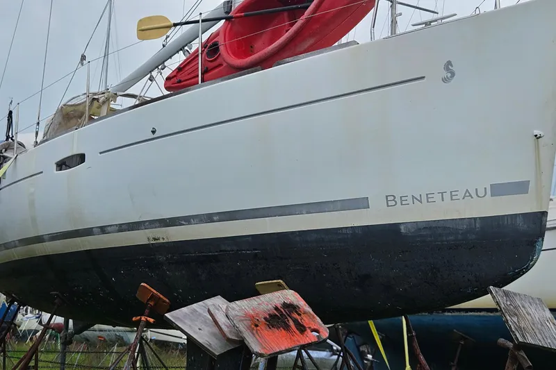 Slide: The Image of Beneteau Oceanis 34 GT 2010 sailboat on stands, viewed from the stern. - 3