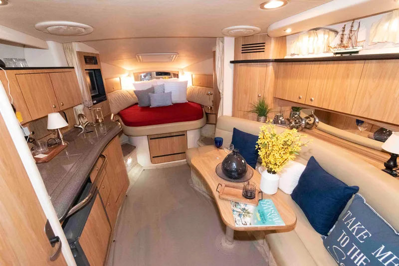 Slide: The Image of Helm of 2006 Sea Ray 320 Sundancer with steering wheel and control panel. - 10