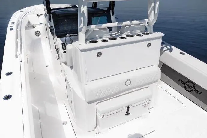 Slide: The Image of 2024 Fountain Bluewater 38 Tournament Edition boat interior with sleek white design and modern console. - 15