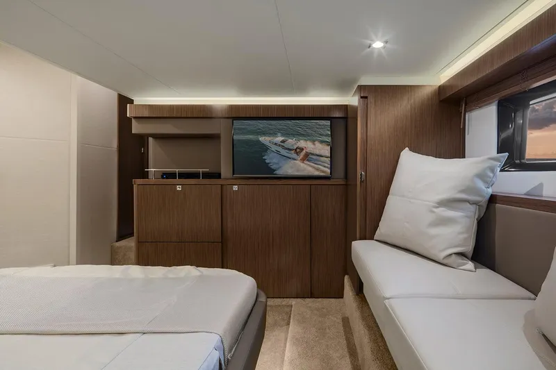 Slide: The Image of Interior of 2017 Sea Ray Sundancer 460 yacht, featuring stairs and wooden doors. - 11