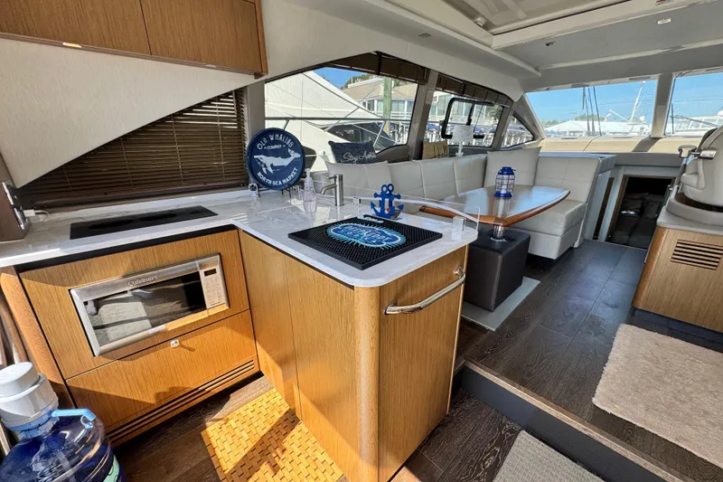 Slide: The Image of Luxurious interior of 2017 Sea Ray Sundancer 460 yacht with modern furnishings and sleek design. - 22