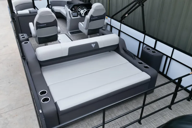 Slide: The Image of 2026 Viaggio Lago X-S pontoon boat interior with gray seating and modern design. - 10