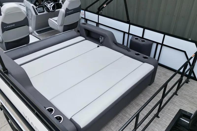 Slide: The Image of 2026 Viaggio Lago X-S boat interior with plush seating and modern design. - 12