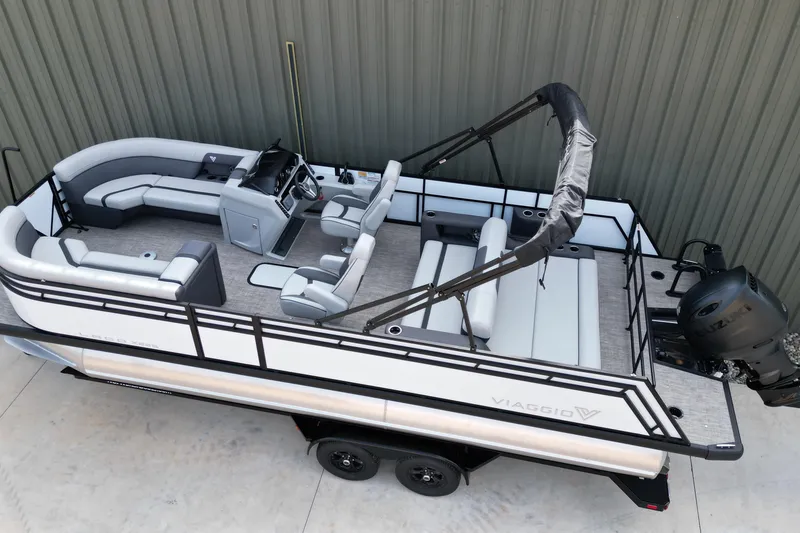 Slide: The Image of 2026 Viaggio Lago X-S pontoon boat with modern seating and sleek design. - 5
