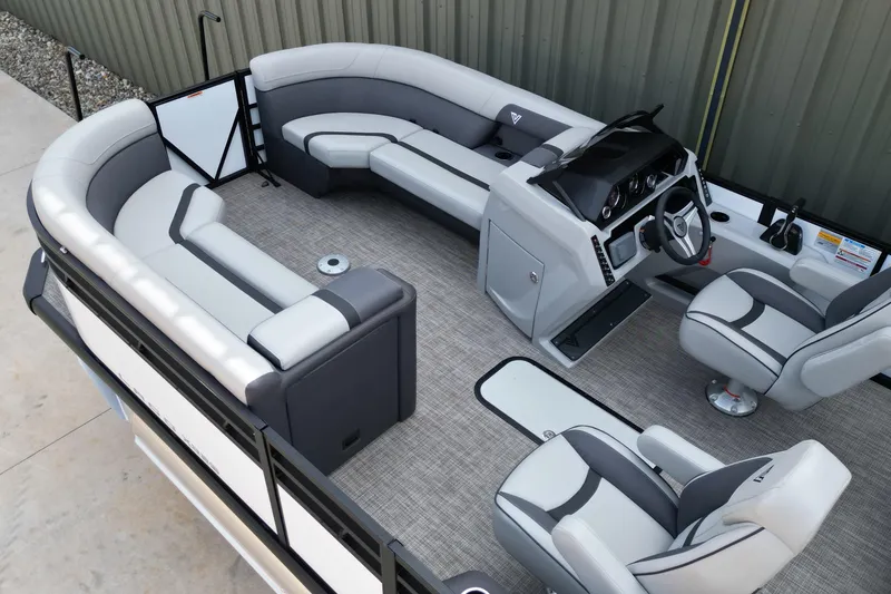 Slide: The Image of Luxurious 2026 Viaggio Lago X-S pontoon boat interior with plush seating and modern helm. - 6