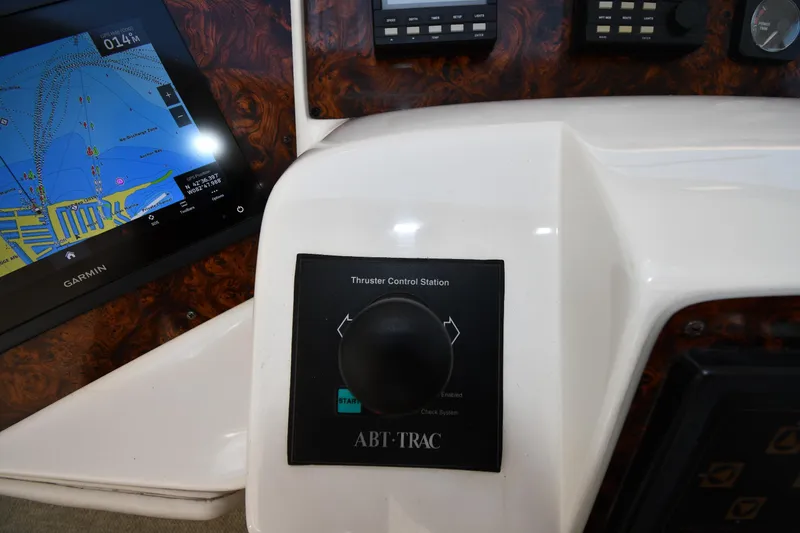 Slide: The Image of Control panel of a 1995 Sea Ray 630 Sundancer with Garmin navigation display. - 17