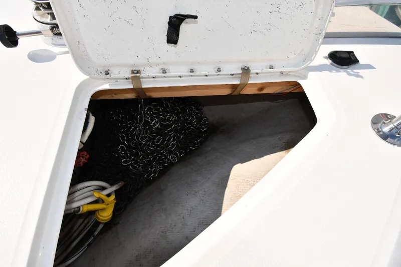 Slide: The Image of Open storage compartment on 1995 Sea Ray 630 Sundancer boat deck. - 5