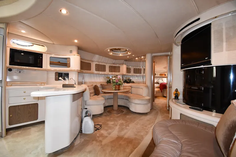 Slide: The Image of Luxurious interior of a 1995 Sea Ray 630 Sundancer yacht with modern amenities. - 51