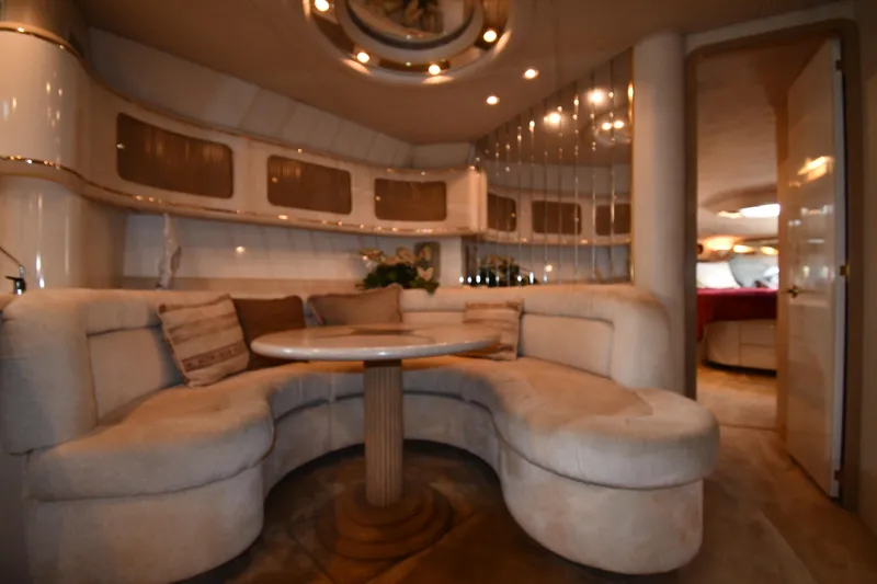 Slide: The Image of Luxurious interior of 1995 Sea Ray 630 Sundancer yacht with plush seating and elegant decor. - 59
