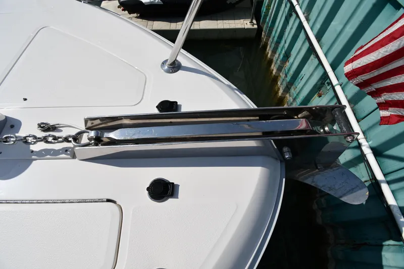 Slide: The Image of Bow of 1995 Sea Ray 630 Sundancer with anchor and chain detail. - 6