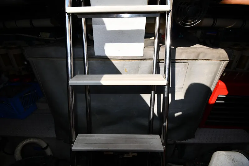 Slide: The Image of Engine room ladder on a 1995 Sea Ray 630 Sundancer yacht. - 79