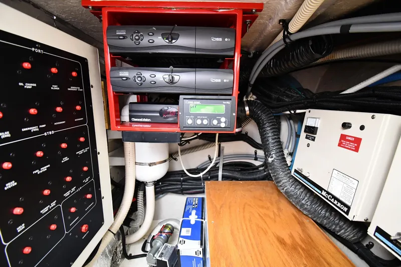 Slide: The Image of Electrical control panel and equipment in 1995 Sea Ray 630 Sundancer yacht. - 88
