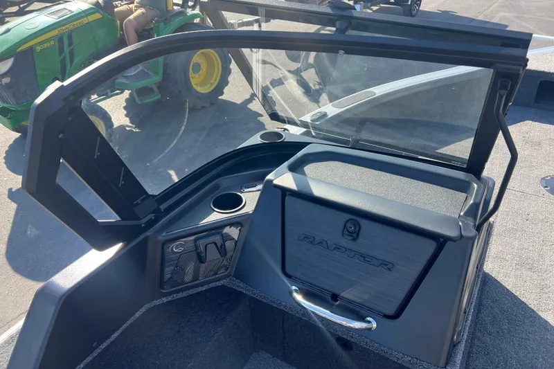 Slide: The Image of 2026 Crestliner 2050 Fish Hawk interior with windshield and storage compartment. - 23