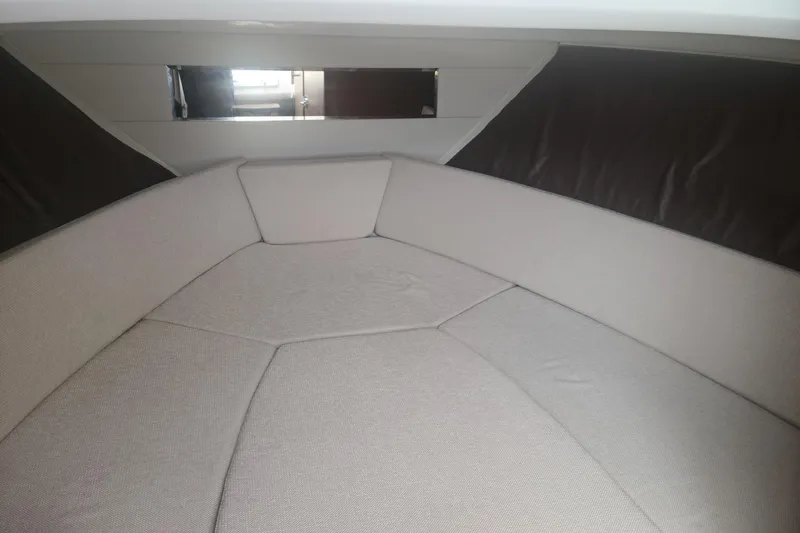 Slide: The Image of Interior cabin of 2020 Jeanneau Leader 9.0 WA with cushioned seating. - 14