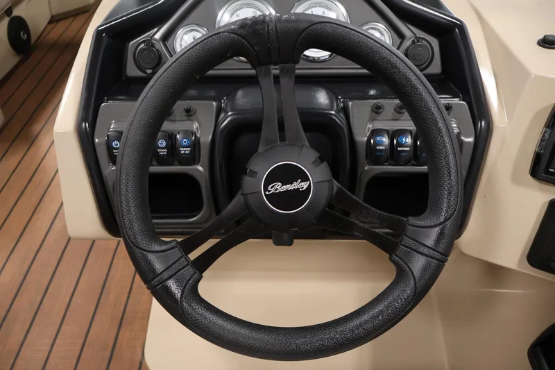 Slide: The Image of Steering wheel of 2026 Bentley Pontoons 243 Swingback Tri-toon with control panel. - 20