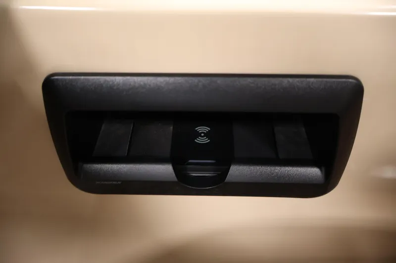 Slide: The Image of 2026 Bentley Pontoons 243 Swingback Tri-toon wireless charging pad close-up. - 25