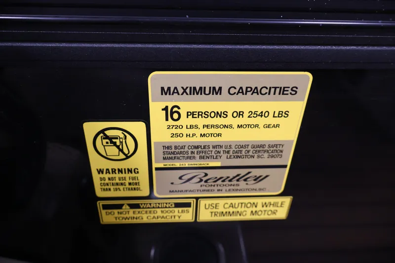 Slide: The Image of 2026 Bentley Pontoons 243 Swingback Tri-toon capacity label, 16 persons or 2540 lbs. - 26