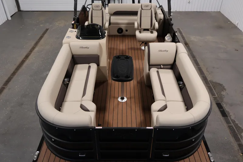 Slide: The Image of 2026 Bentley Pontoons 243 Swingback Tri-toon with luxurious seating and sleek design. - 8