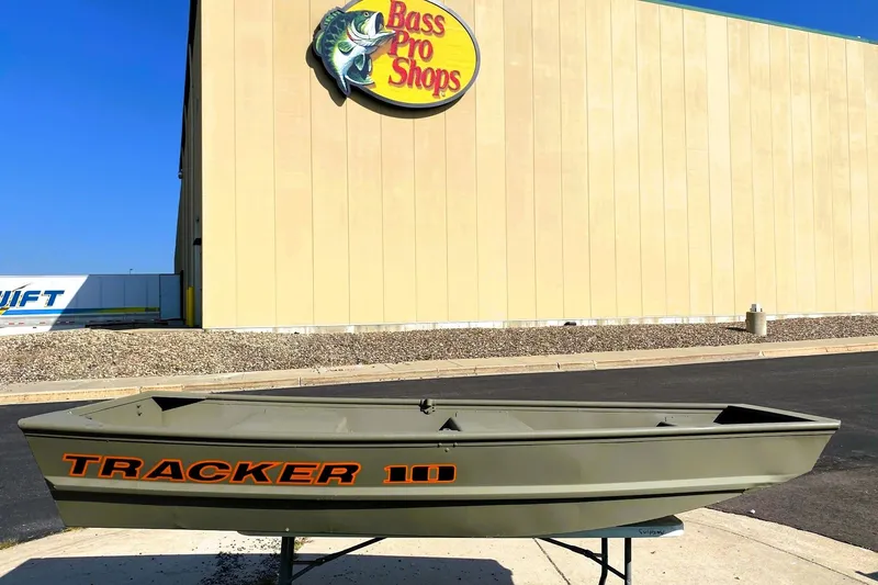 The Image of 2026 Tracker Grizzly 10 Jon boat displayed outside Bass Pro Shops. - 0