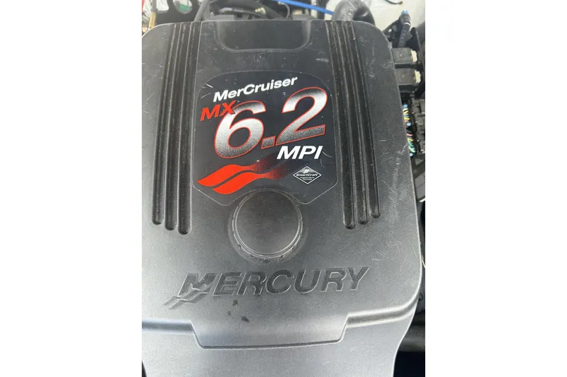 Slide: The Image of Engine cover of a 2003 Chris-Craft Corsair 28 with MerCruiser MX 6.2 MPI. - 17