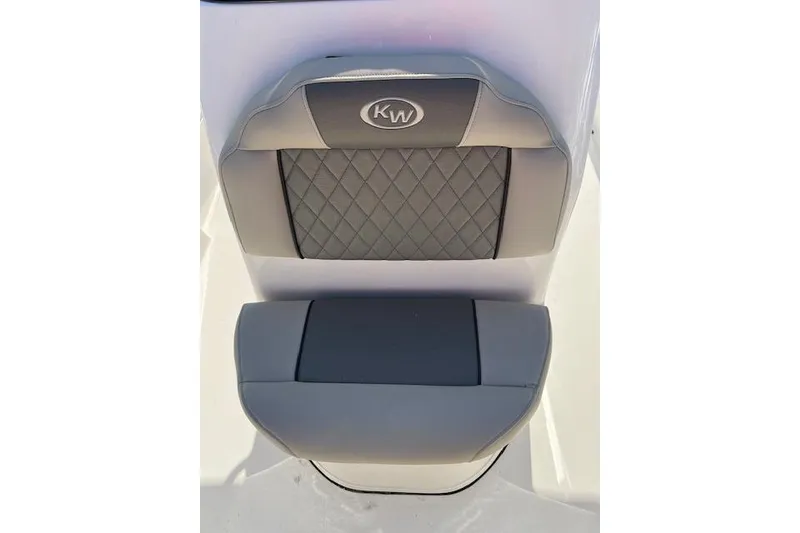 Slide: The Image of 2026 Key West 203 FS boat seat with quilted gray upholstery and KW logo. - 9