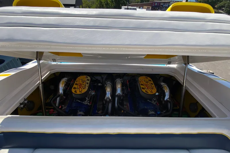 Slide: The Image of 2001 Donzi ZX boat engine compartment with dual high-performance engines. - 12