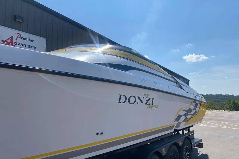 Slide: The Image of 2001 Donzi ZX boat on trailer under clear blue sky. - 22