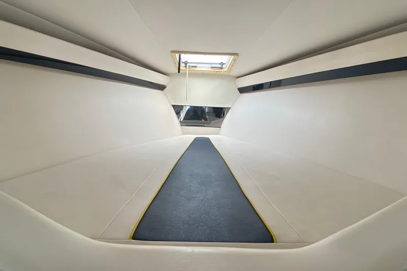 Slide: The Image of Interior cabin of a 2001 Donzi ZX boat, featuring sleek, modern design. - 27