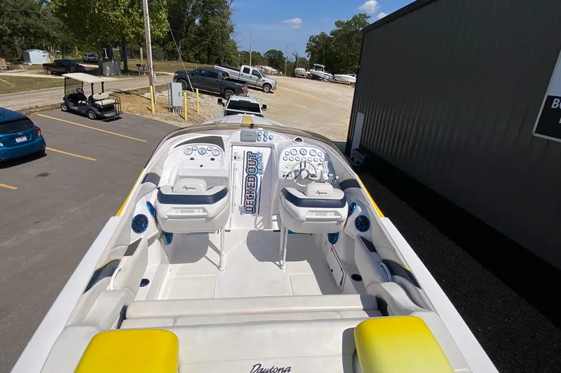 Slide: The Image of 2001 Donzi ZX boat interior with dual seats and control panel. - 4