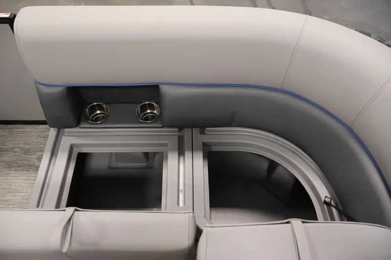 Slide: The Image of 2026 Bentley Pontoons 203 Bolt Tri-Toon interior seating with storage compartments and cup holders. - 12