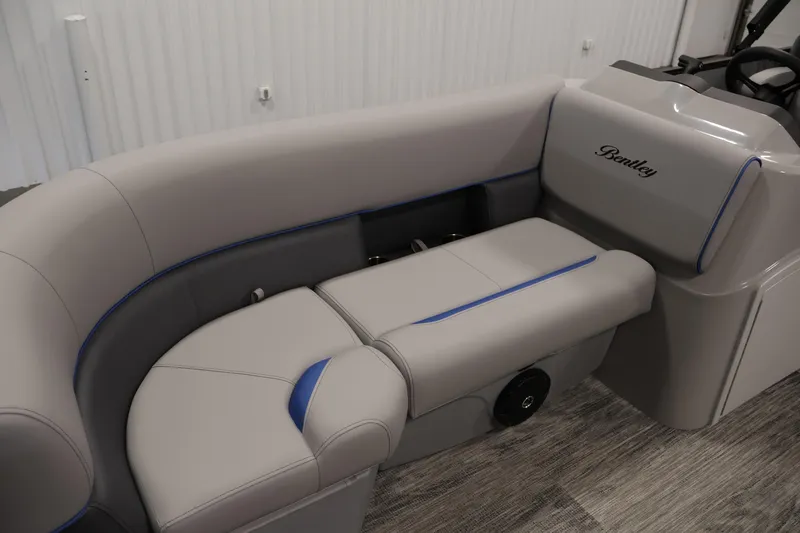 Slide: The Image of 2026 Bentley Pontoons 203 Bolt Tri-Toon interior seating with elegant gray upholstery. - 13