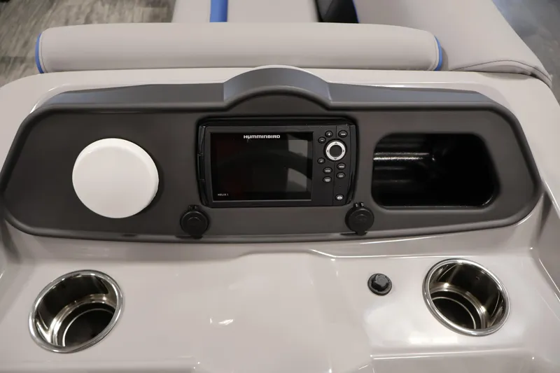 Slide: The Image of 2026 Bentley Pontoons 203 Bolt Tri-Toon dashboard with Humminbird display and cup holders. - 19