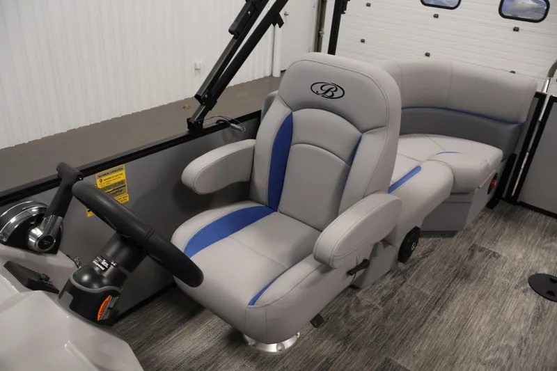 Slide: The Image of 2026 Bentley Pontoons 203 Bolt Tri-Toon interior with luxurious seating and modern design. - 24