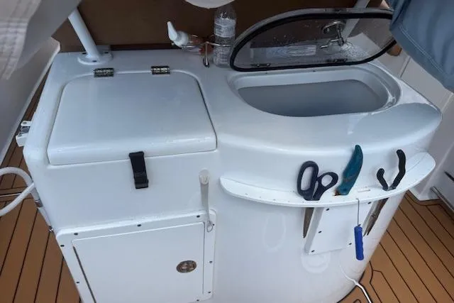 Slide: The Image of 2022 Sea Hunt Gamefish 30 Forward Seating boat with utility station and tools. - 7