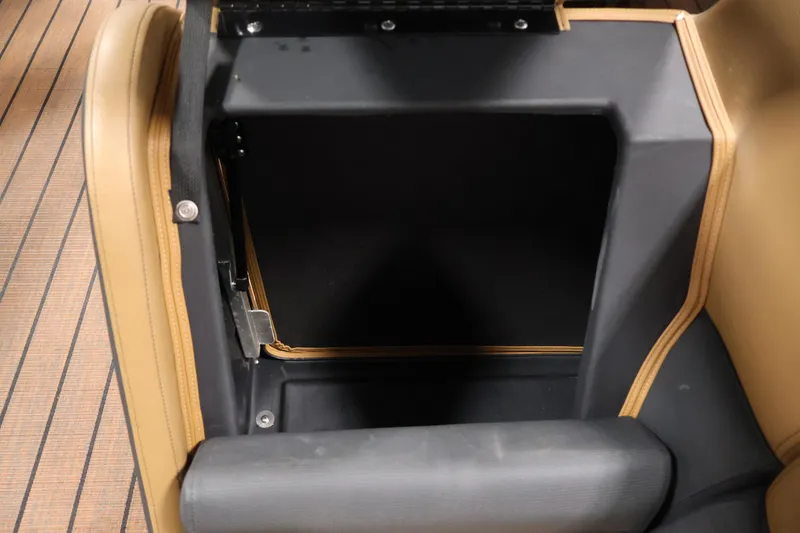 Slide: The Image of 2026 Bentley Pontoons Elite 253 interior with tan leather seating and cup holders. - 12